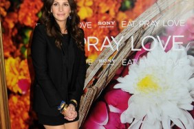 Julia Roberts, Black Jacket, strappy black heels, black shorts, bracelets